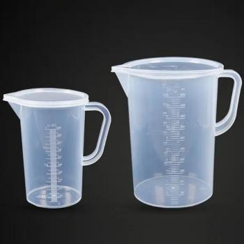 Plastic measuring beaker